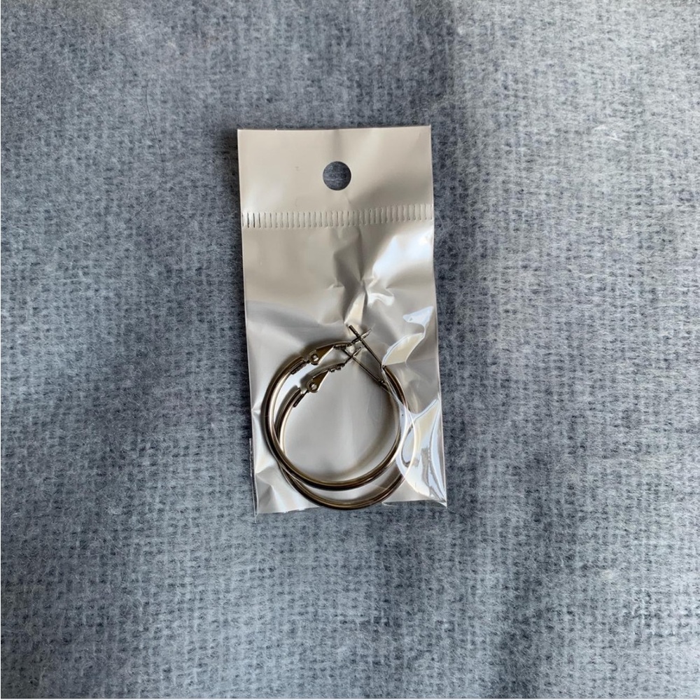 Small hoop earrings in silver color
